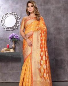 Orange saree with gold accents