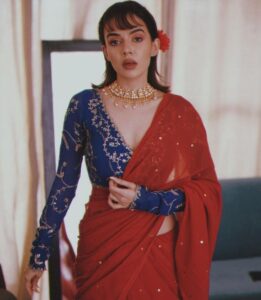 Red saree with a blue blouse